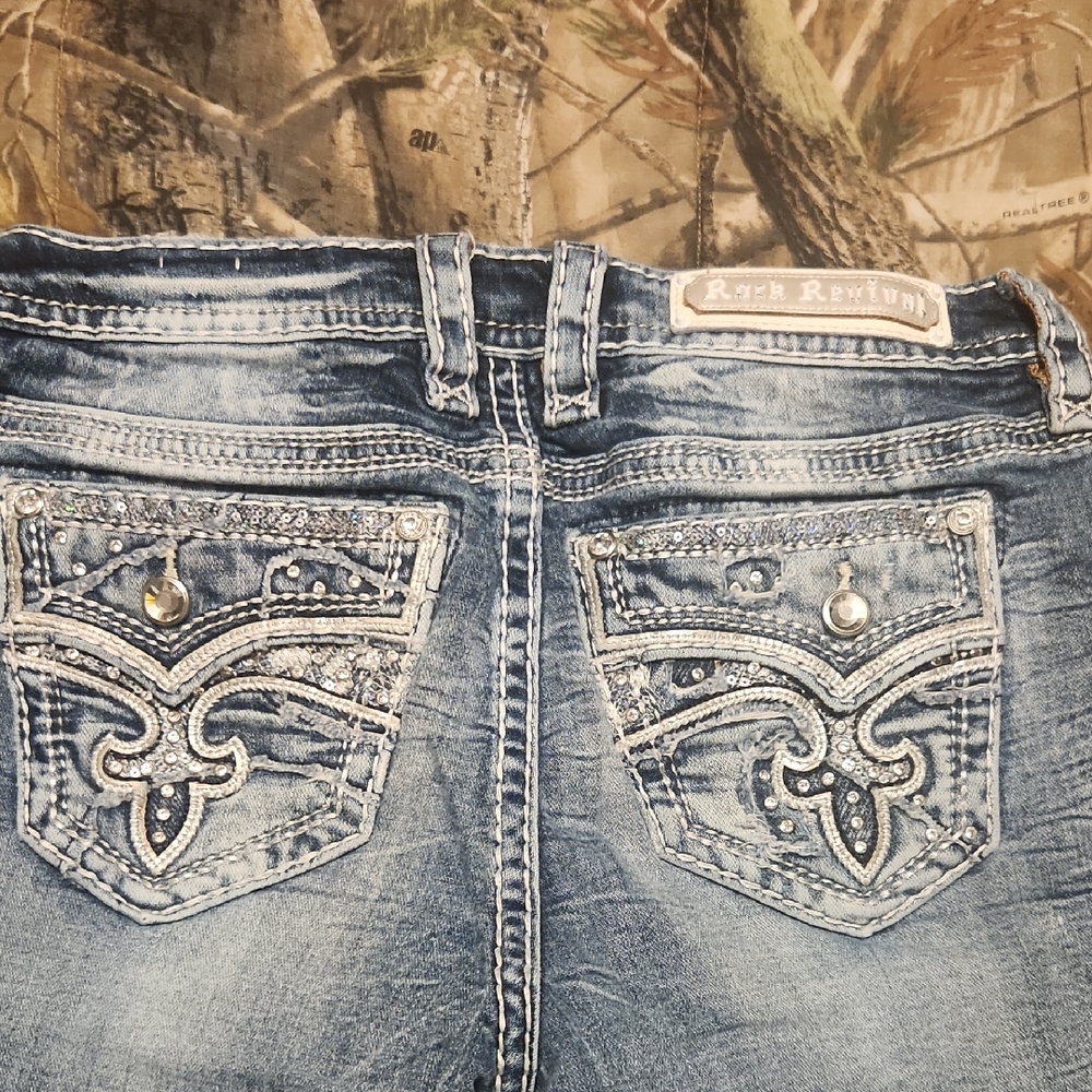 Rock Revival Light Blue Boot Cut Jeans with Silver Accents